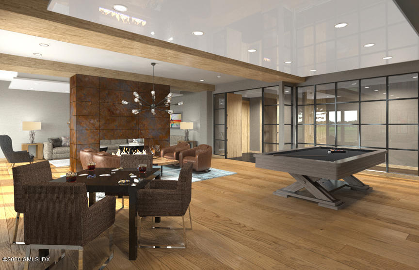 16 Old Track Road, Unit PH 2 Greenwich, CT 06830 - Photo 5 of 23 a living room with couches a table and chairs with wooden floor