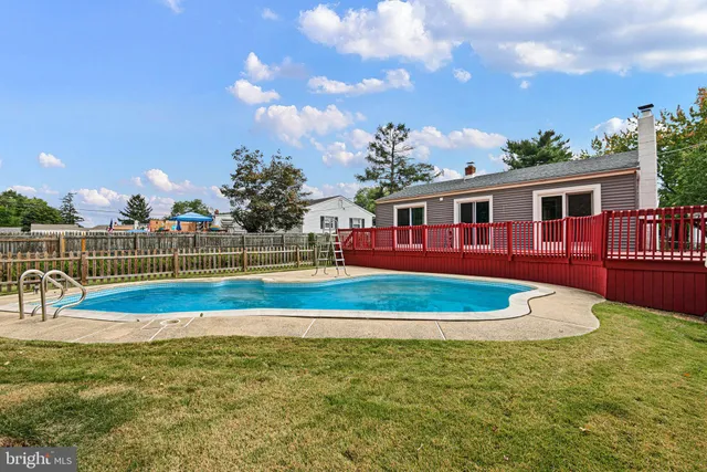 a view of a house with a swimming pool