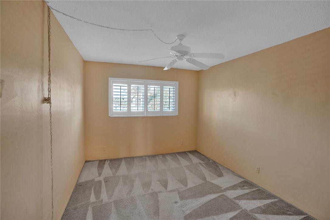 801 North Riverside Drive, Unit 7B Pompano Beach, FL 33062 - Photo 12 of 26 an empty room with a window