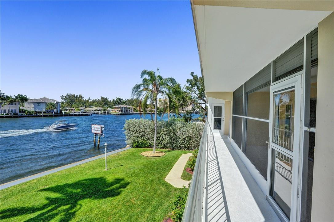 801 North Riverside Drive, Unit 7B Pompano Beach, FL 33062 - Photo 20 of 26 a view of a balcony with lake view