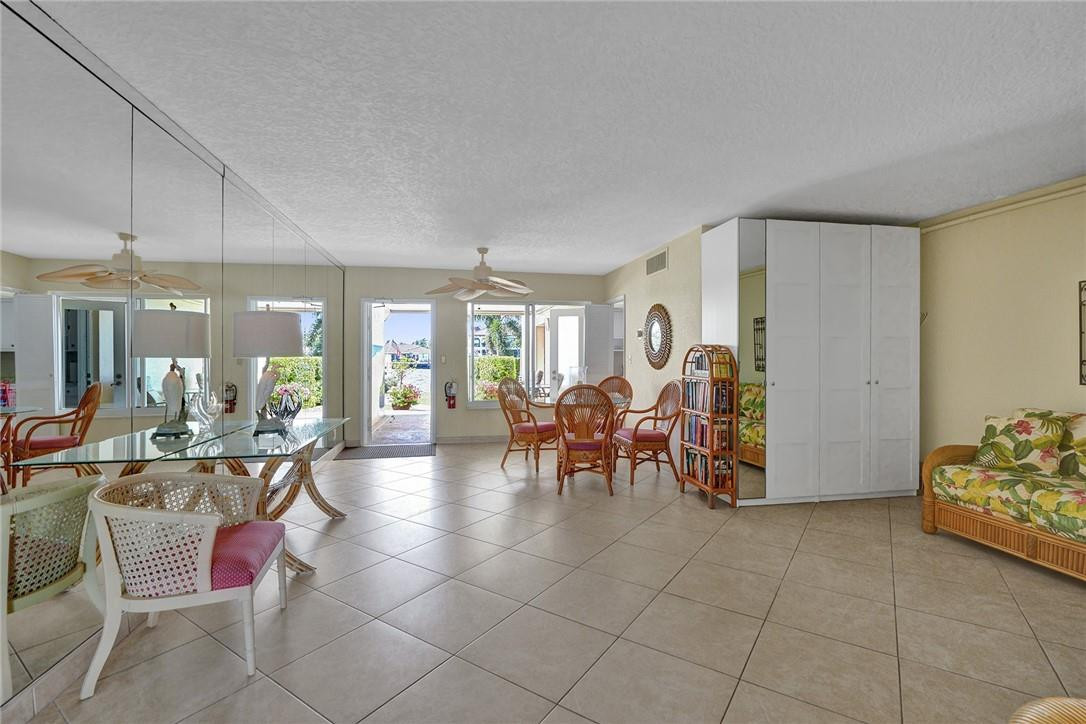 801 North Riverside Drive, Unit 7B Pompano Beach, FL 33062 - Photo 23 of 26 a lobby with furniture and window