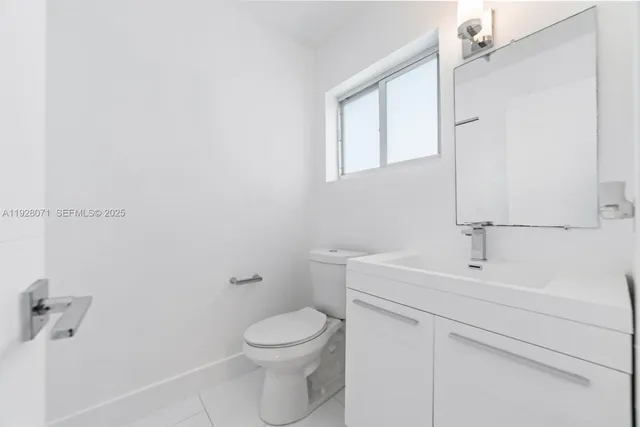 a bathroom with a tub and sink