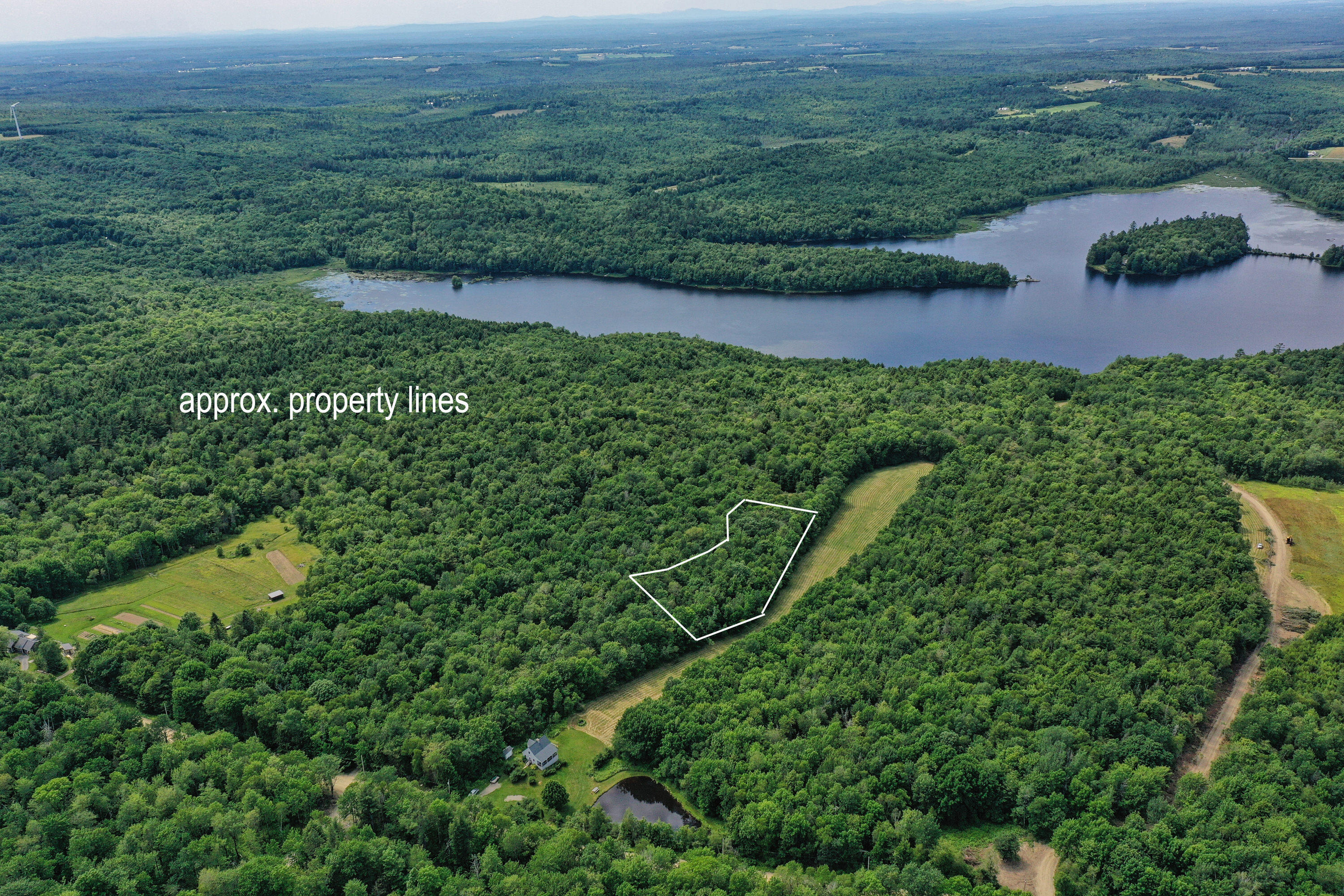 M5-l24 Goosepecker Ridge Road Montville, ME 04941 - Photo 2 of 15 DJI_0532a