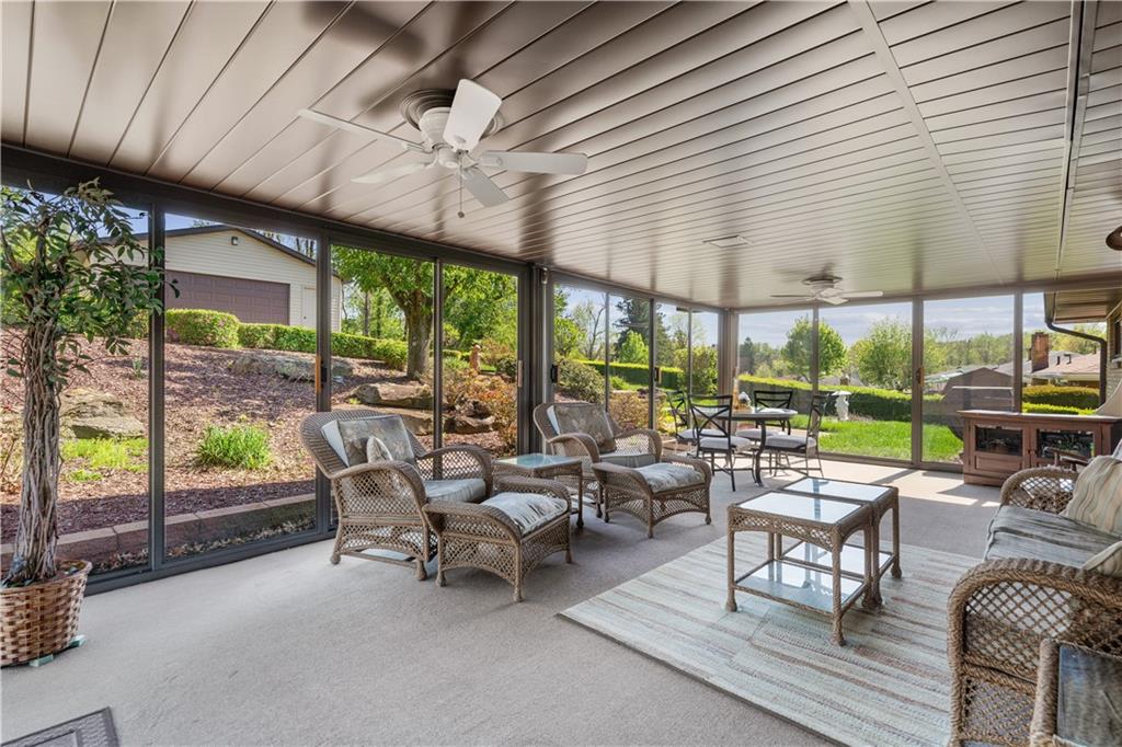 25 Willow Drive Monessen, PA 15062 - Photo 12 of 33 a living room with patio furniture and a floor to ceiling window