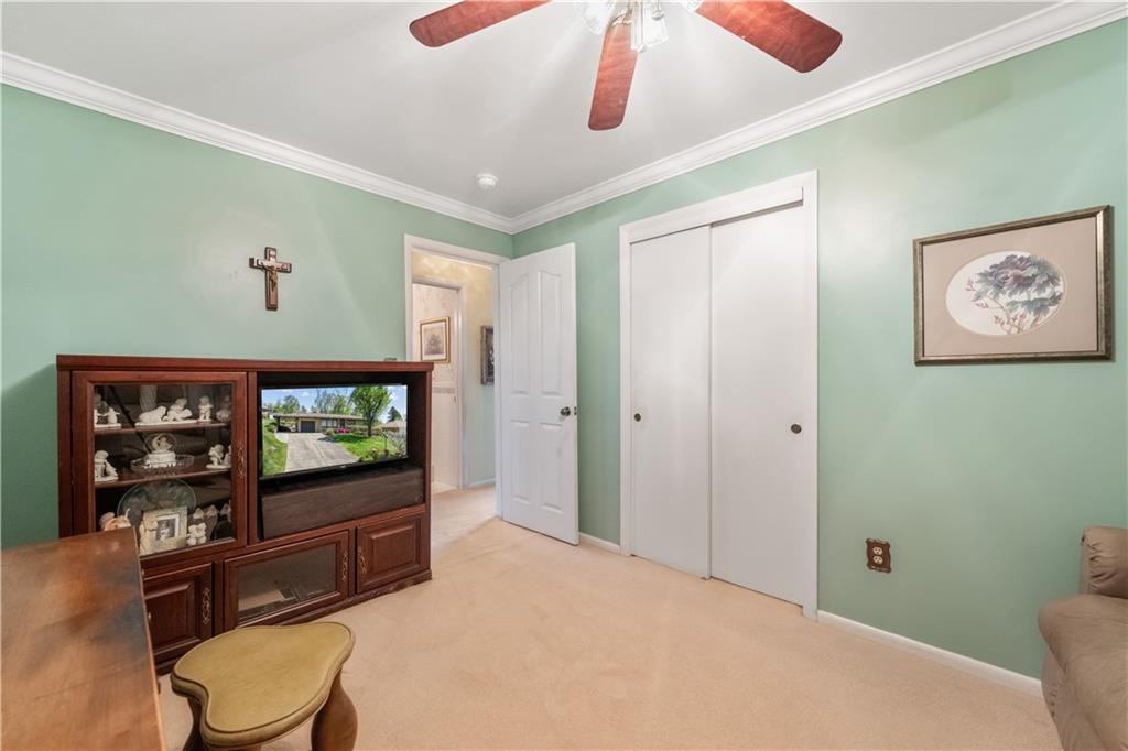 25 Willow Drive Monessen, PA 15062 - Photo 17 of 33 a living room with furniture and a flat screen tv