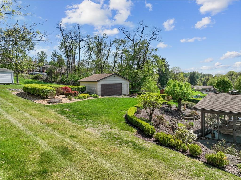 25 Willow Drive Monessen, PA 15062 - Photo 24 of 33 a front view of a house with garden