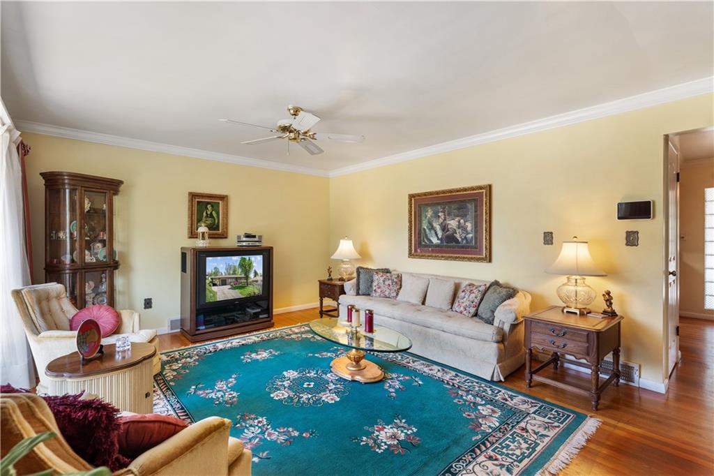 25 Willow Drive Monessen, PA 15062 - Photo 3 of 33 a living room with furniture and a flat screen tv