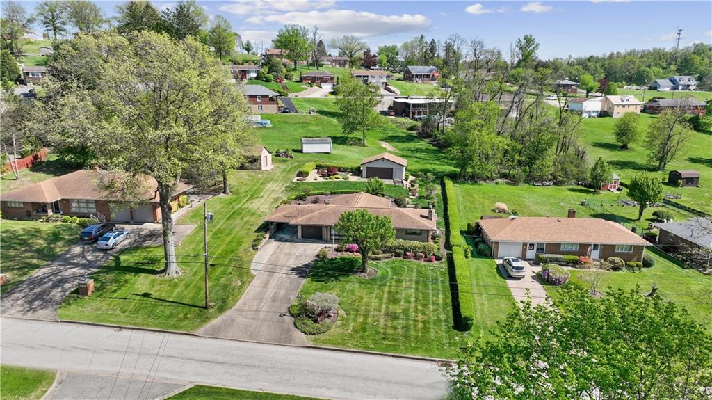 25 Willow Drive Monessen, PA 15062 - Photo 32 of 33 an aerial view of multiple houses with yard