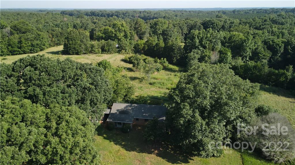 9030 Potter Road Lancaster, SC 29720 - Photo 9 of 26 an aerial view of a house with a yard