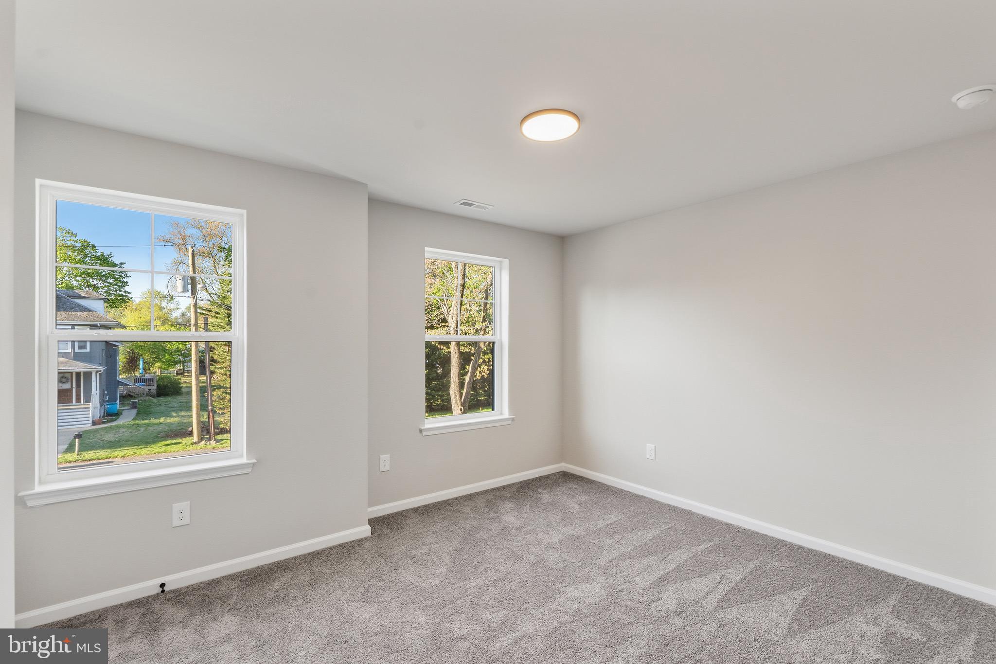 212 Lotus Avenue Voorhees, NJ 08043 - Photo 18 of 39 an empty room with windows