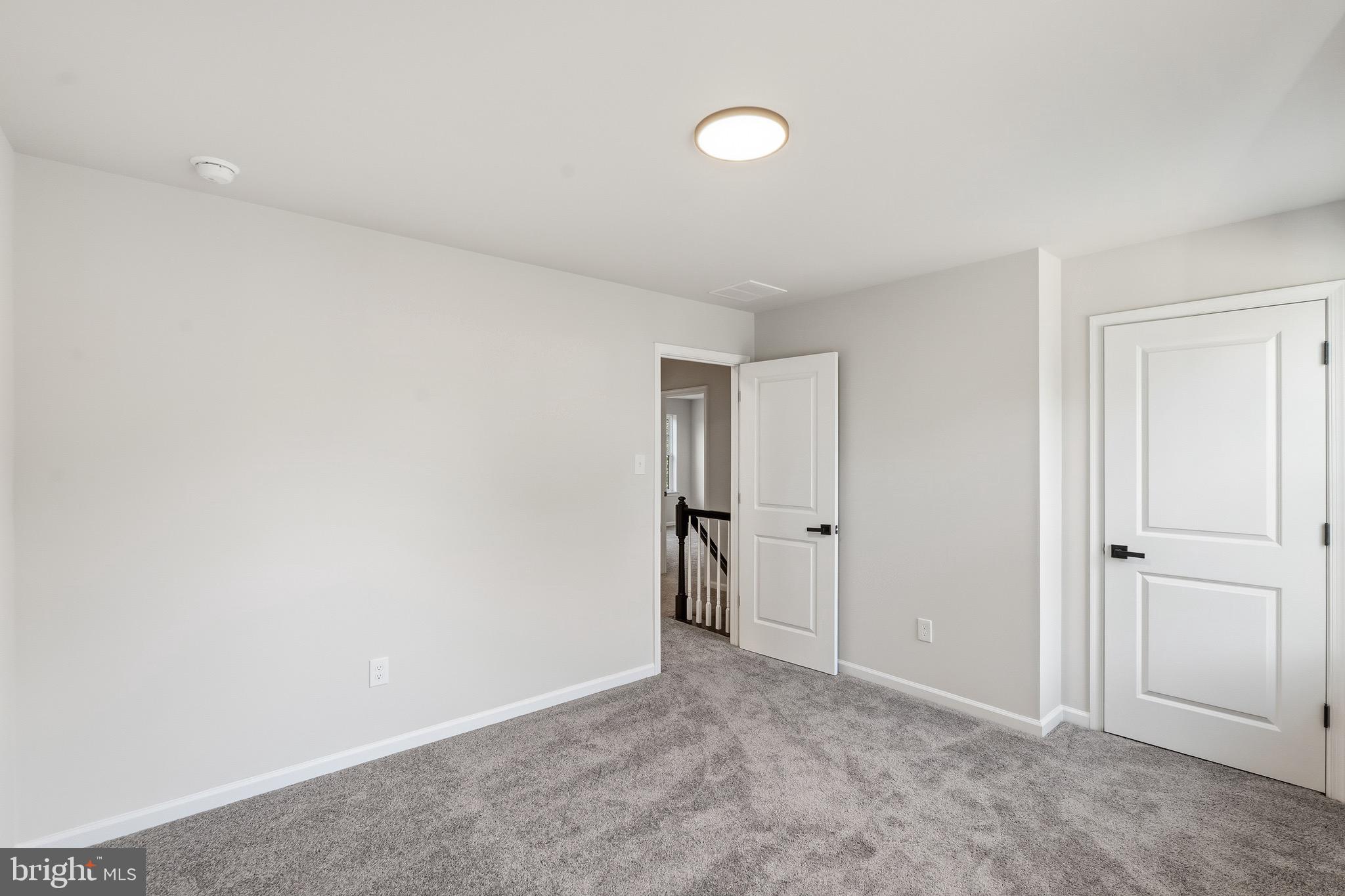 212 Lotus Avenue Voorhees, NJ 08043 - Photo 19 of 39 a view of an empty room