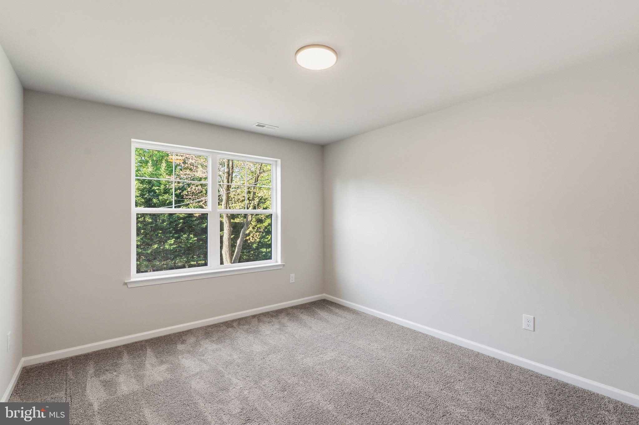 212 Lotus Avenue Voorhees, NJ 08043 - Photo 21 of 39 an empty room with a window