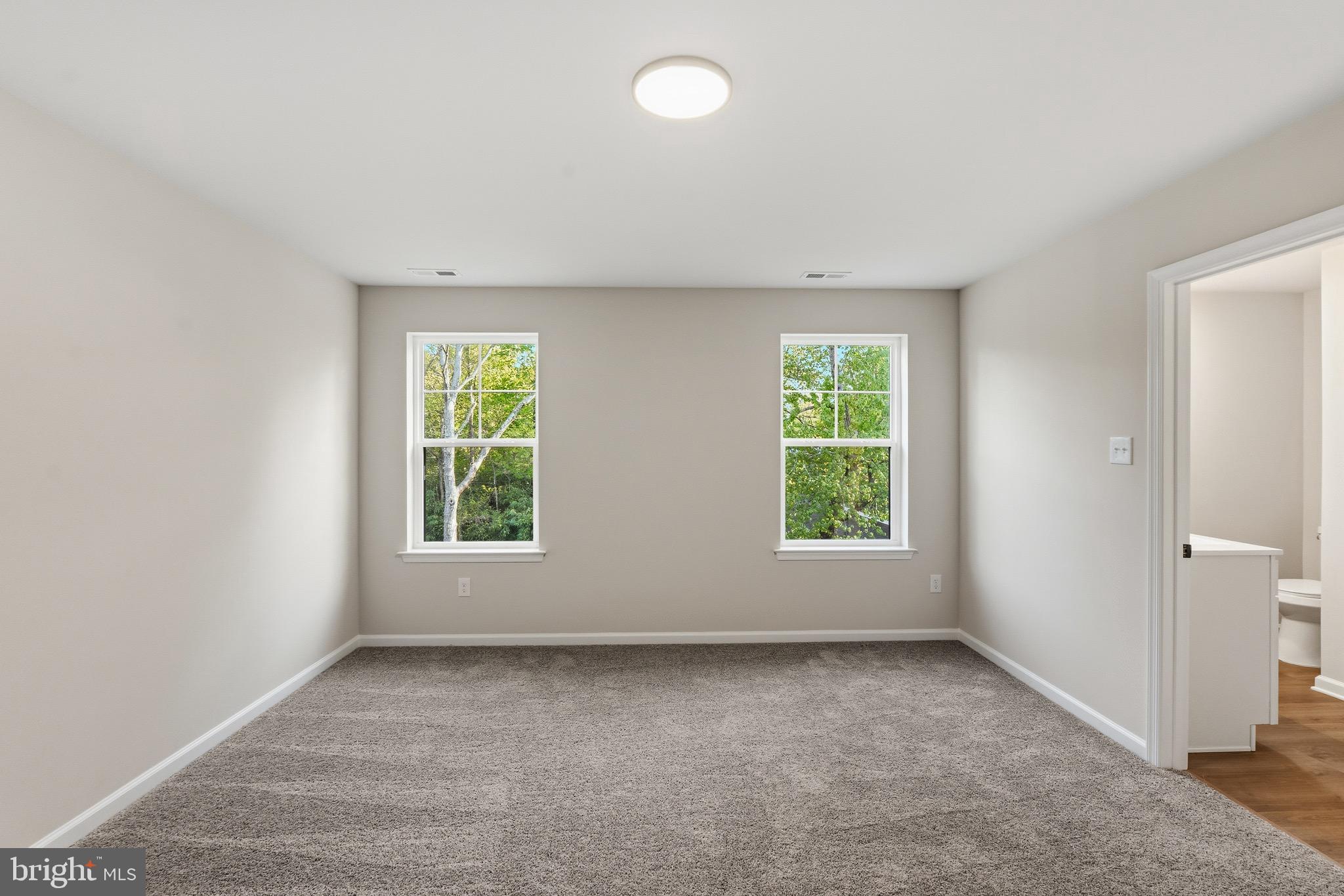 212 Lotus Avenue Voorhees, NJ 08043 - Photo 26 of 39 an empty room with a window