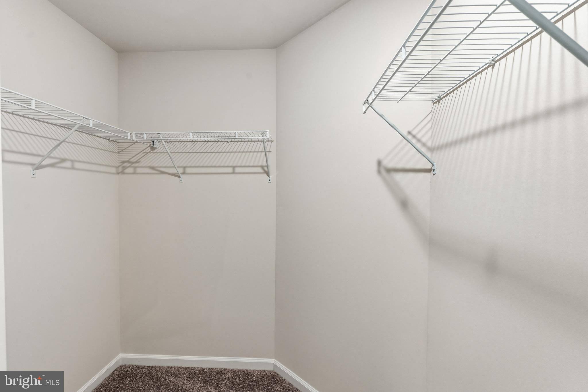 212 Lotus Avenue Voorhees, NJ 08043 - Photo 31 of 39 a view of a room with racks on the wall