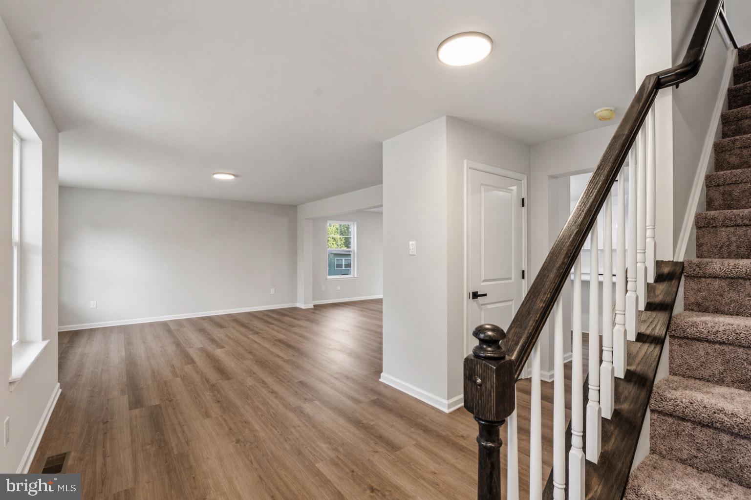 212 Lotus Avenue Voorhees, NJ 08043 - Photo 4 of 39 a view of an entryway with wooden floor