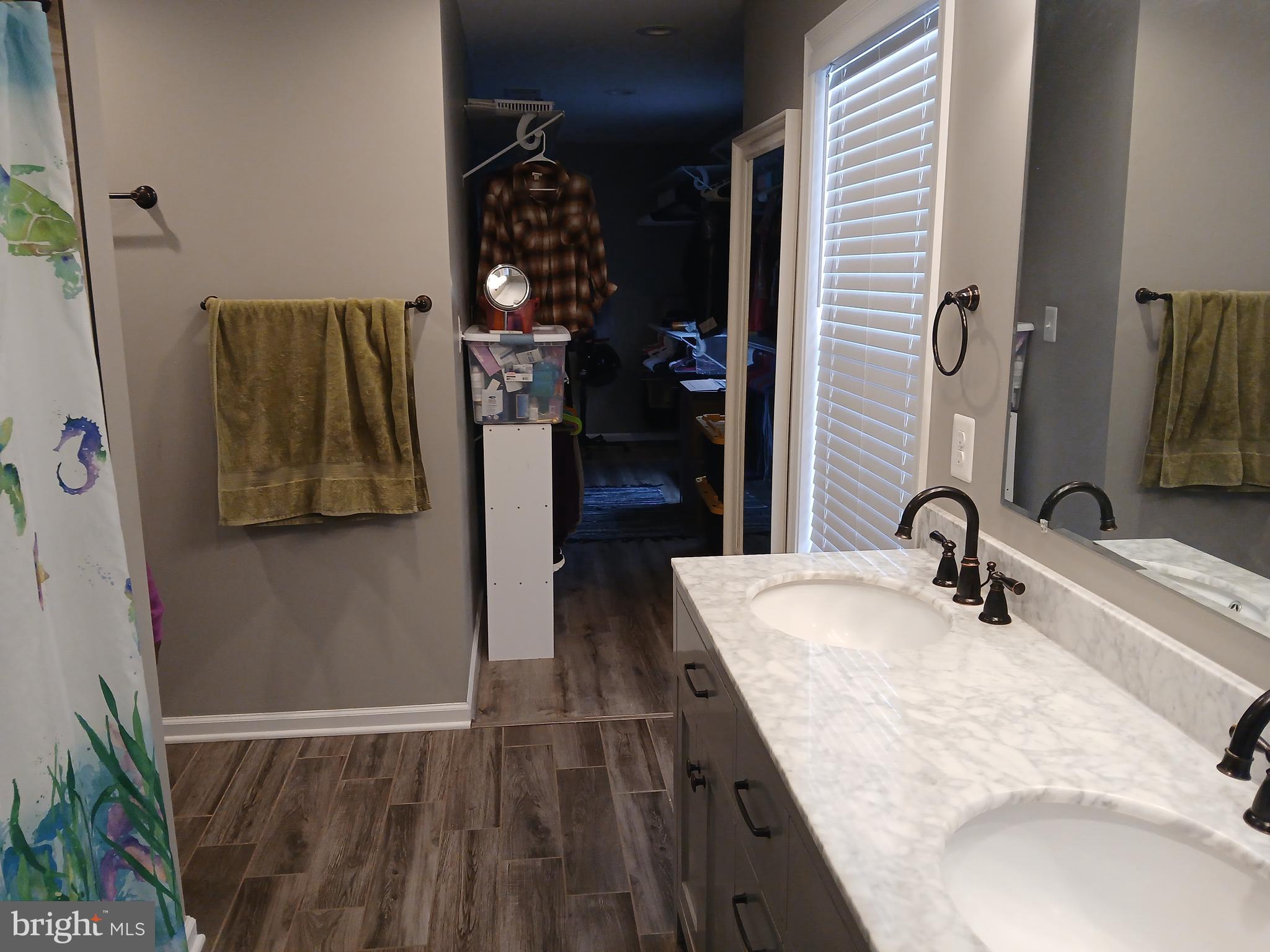 11337 Russell Road Purcellville, VA 20132 - Photo 14 of 18 a bathroom with a sink and a mirror