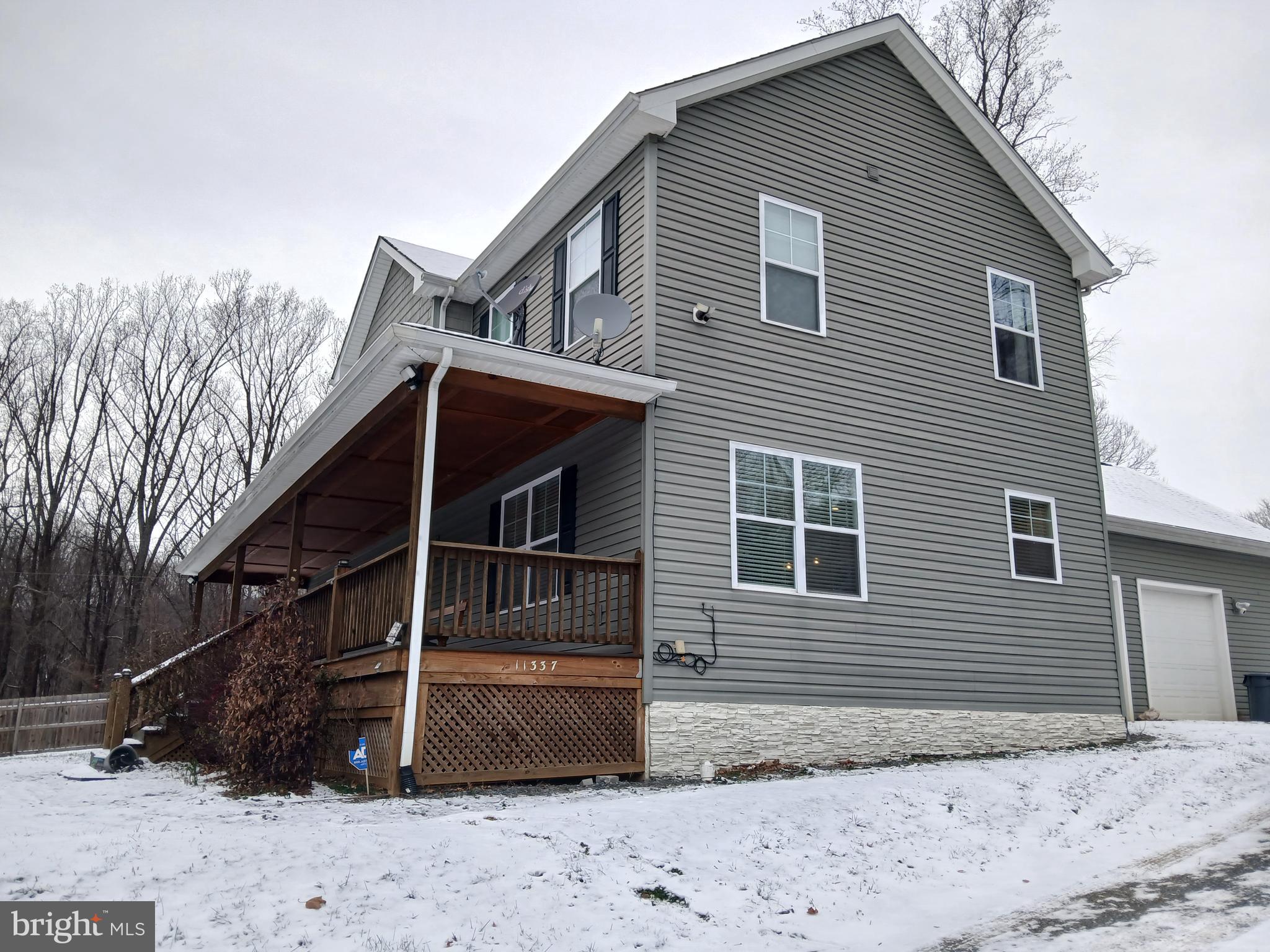 11337 Russell Road Purcellville, VA 20132 - Photo 2 of 18 a view of backyard of house