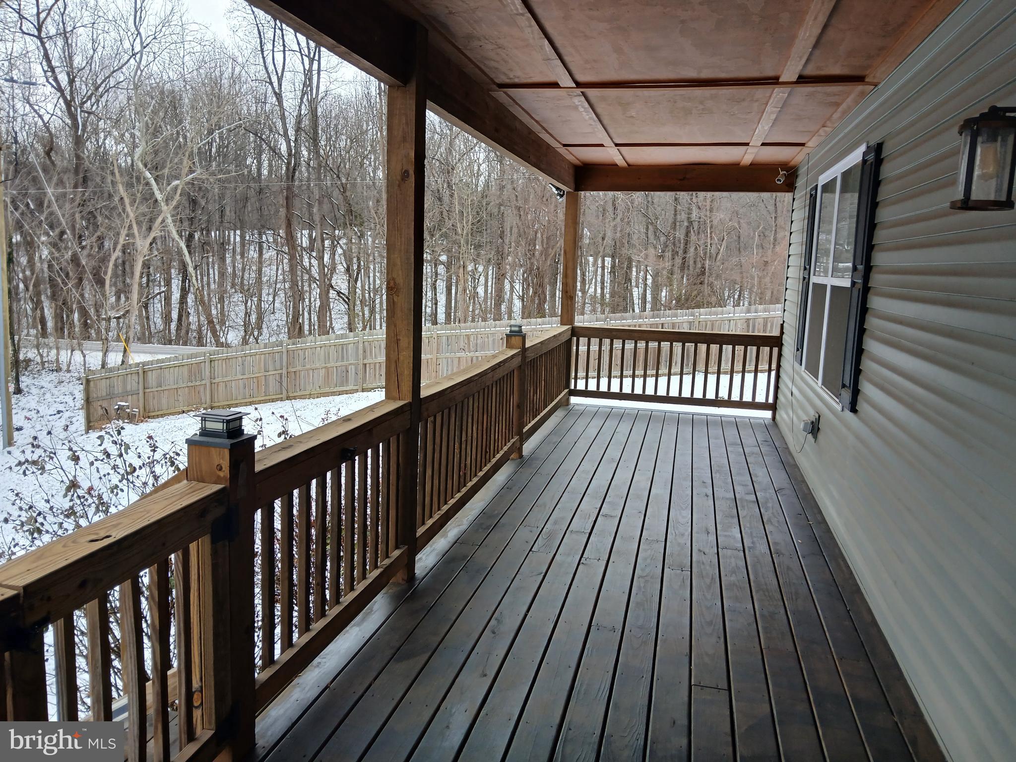 11337 Russell Road Purcellville, VA 20132 - Photo 3 of 18 a view of a porch with wooden floor