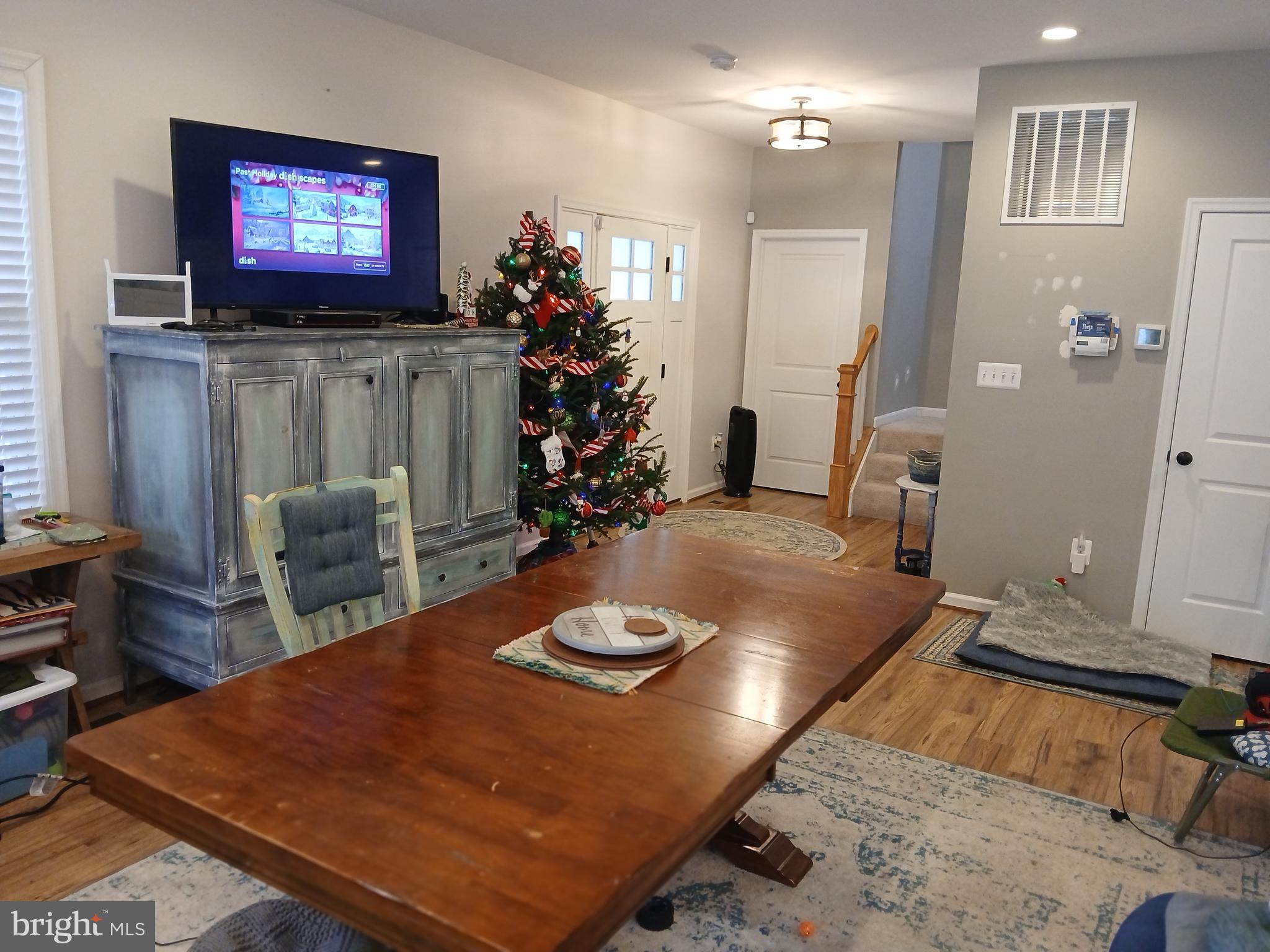 11337 Russell Road Purcellville, VA 20132 - Photo 5 of 18 a living room with furniture and a flat screen tv