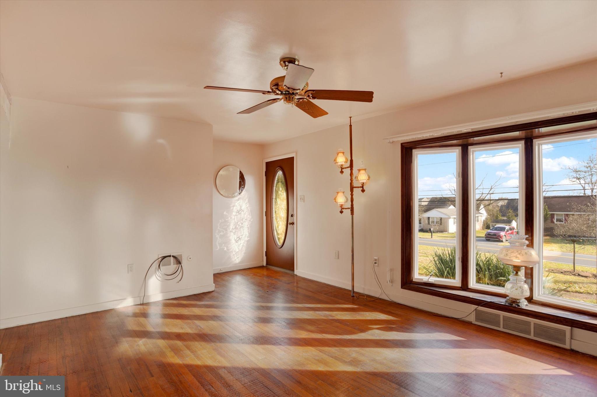 5924 Devonshire Heights Road Harrisburg, PA 17112 - Photo 8 of 33 a view of an empty room with a window