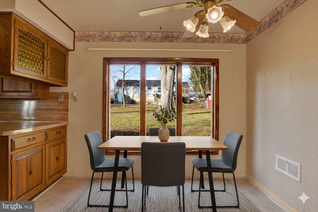 5924 Devonshire Heights Road Harrisburg, PA 17112 - Photo 10 of 33 a view of a dining room with furniture window and outside view