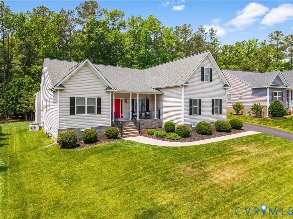 10824 Avening Road Chesterfield, VA 23832 - Photo 2 of 47 a front view of a house with garden