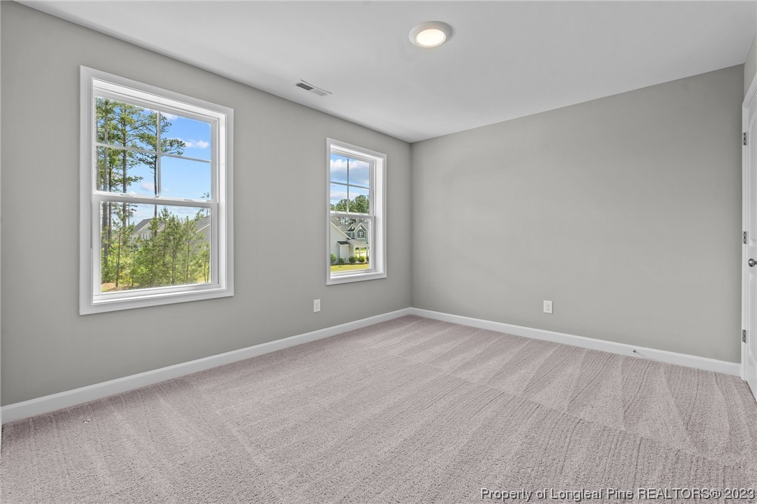 41 Timber Hill Crossing Spring Lake Spring Lake, NC 28390 - Photo 12 of 16 an empty room with windows