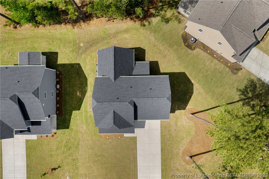 41 Timber Hill Crossing Spring Lake Spring Lake, NC 28390 - Photo 14 of 16 an aerial view of a house with outdoor space and a lake view