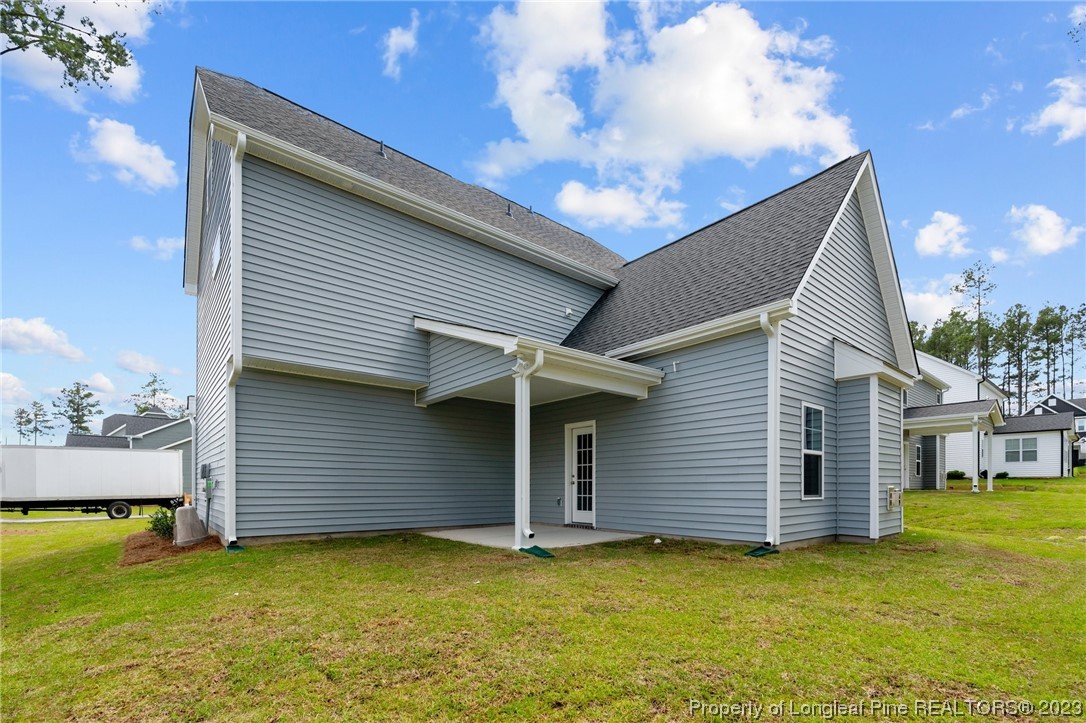 41 Timber Hill Crossing Spring Lake Spring Lake, NC 28390 - Photo 16 of 16 a view of a house with a patio