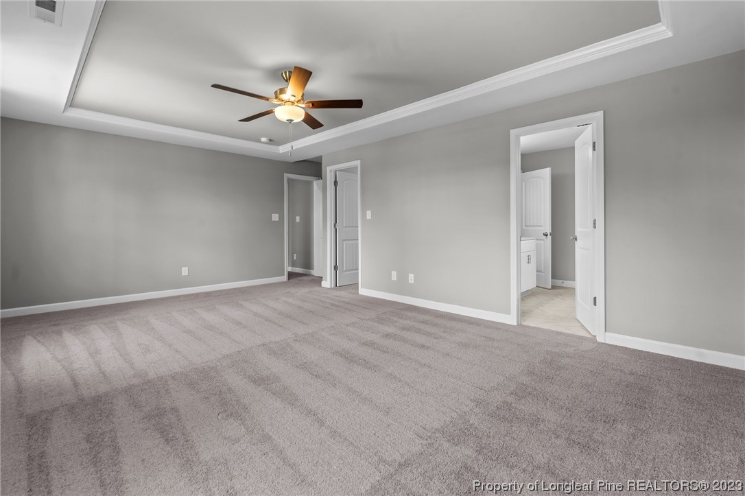 41 Timber Hill Crossing Spring Lake Spring Lake, NC 28390 - Photo 7 of 16 a view of an empty room with a ceiling fan