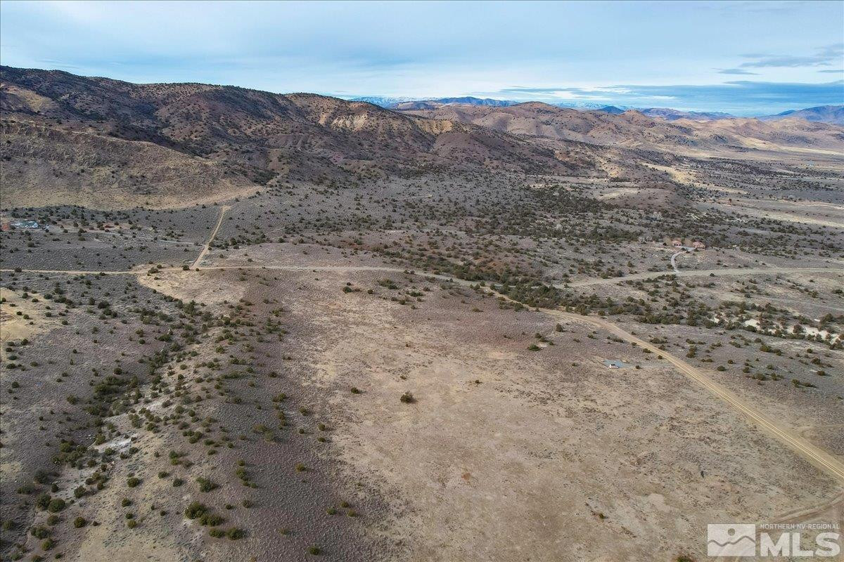 485 Chantry Reno, NV 89510 - Photo 14 of 24 a view of a dry field with mountains in the background