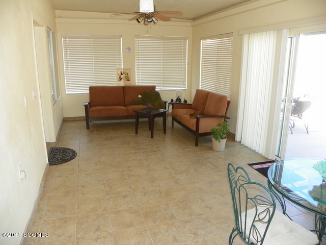 1809 Círculo Tortuga Rio Rico, AZ 85648 - Photo 13 of 26 a living room with furniture and a window