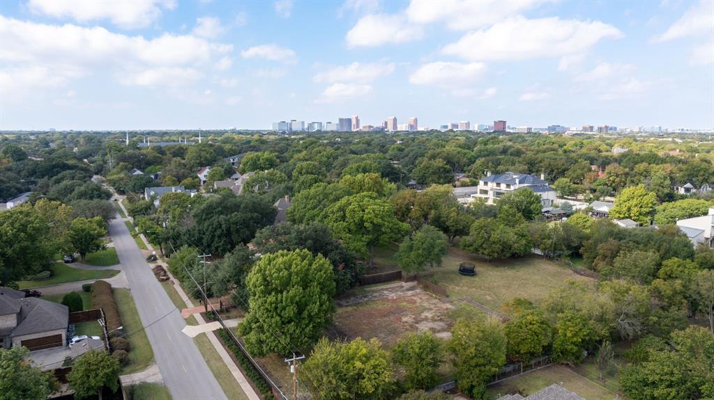6639 Willow Lane Dallas, TX 75230 - Photo 13 of 14 a view of a city with lush green forest