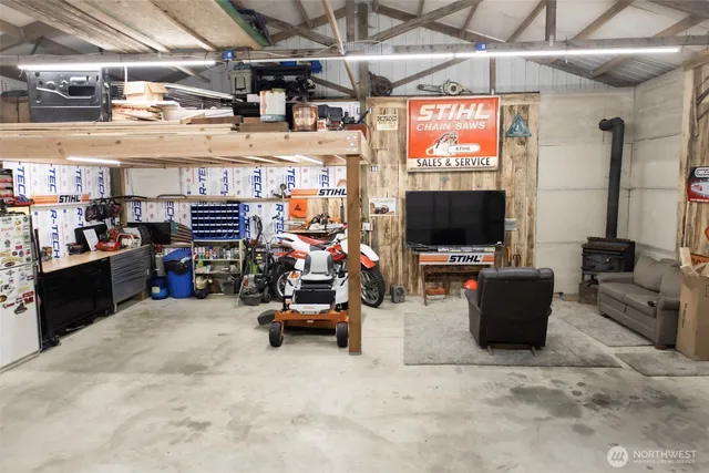 a living room with lots of furniture and a flat screen tv