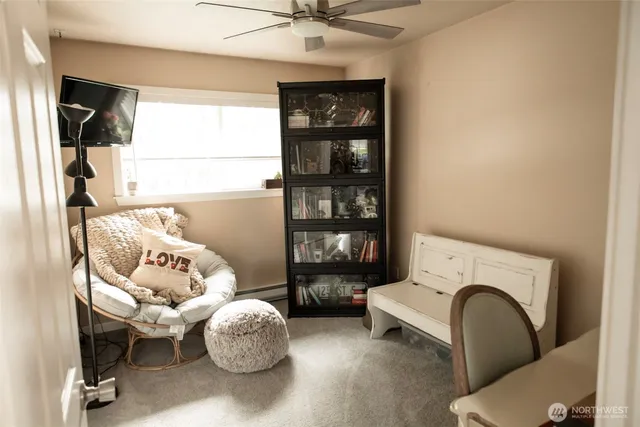 a living room with furniture and decor