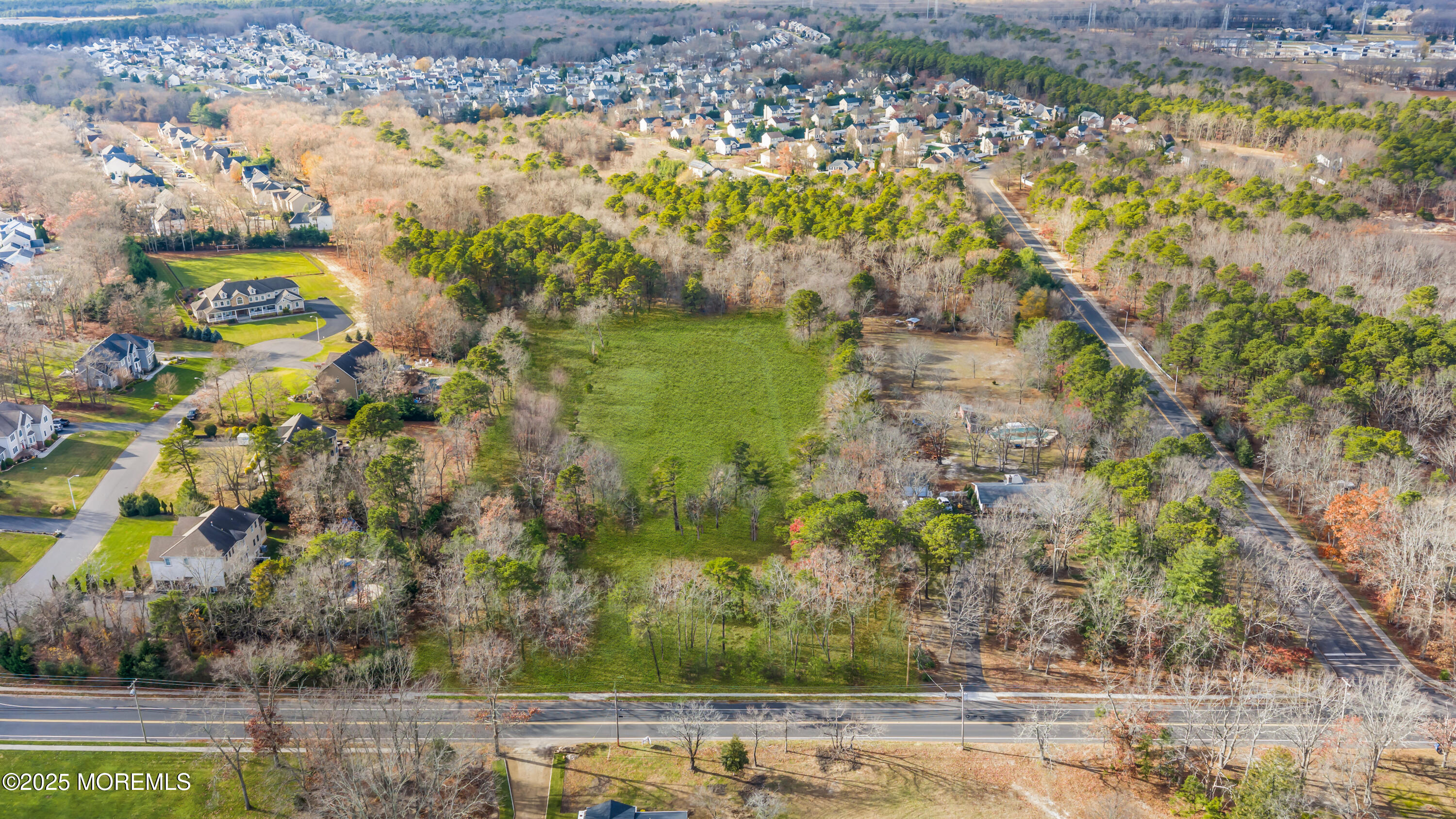 a view of a lake with a big yard