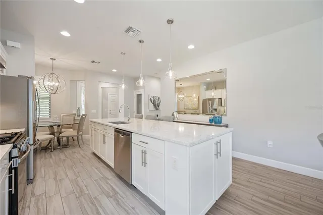 a view of a swimming pool with a patio