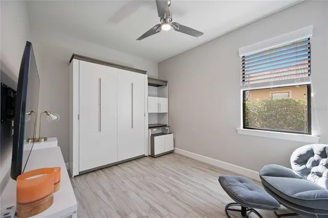 an aerial view of a house with yard