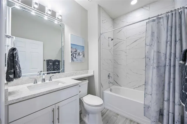 an aerial view of house with yard