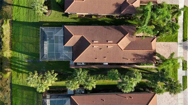 a view of a yard and car parked