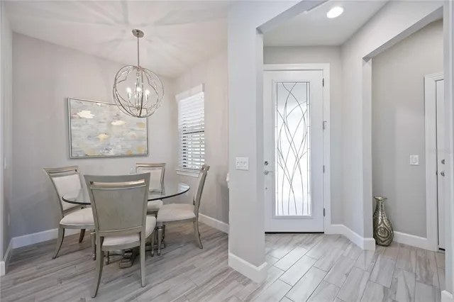 a kitchen with a sink stove and refrigerator