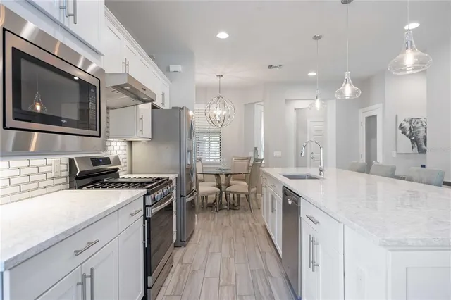 a view of swimming pool with outdoor seating