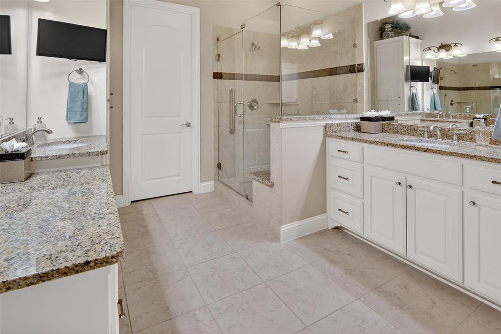 825 Milton Way Coppell, TX 75019 - Photo 17 of 35 a bathroom with a granite countertop sink mirror and