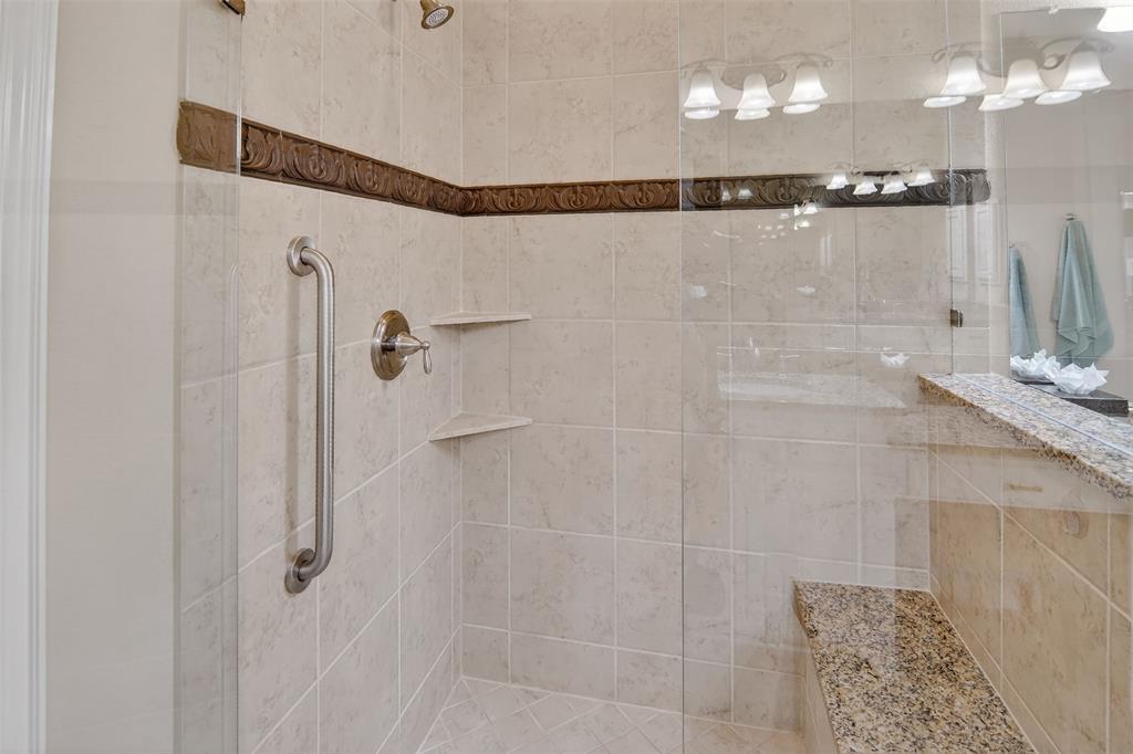 825 Milton Way Coppell, TX 75019 - Photo 18 of 35 a bathroom with a shower
