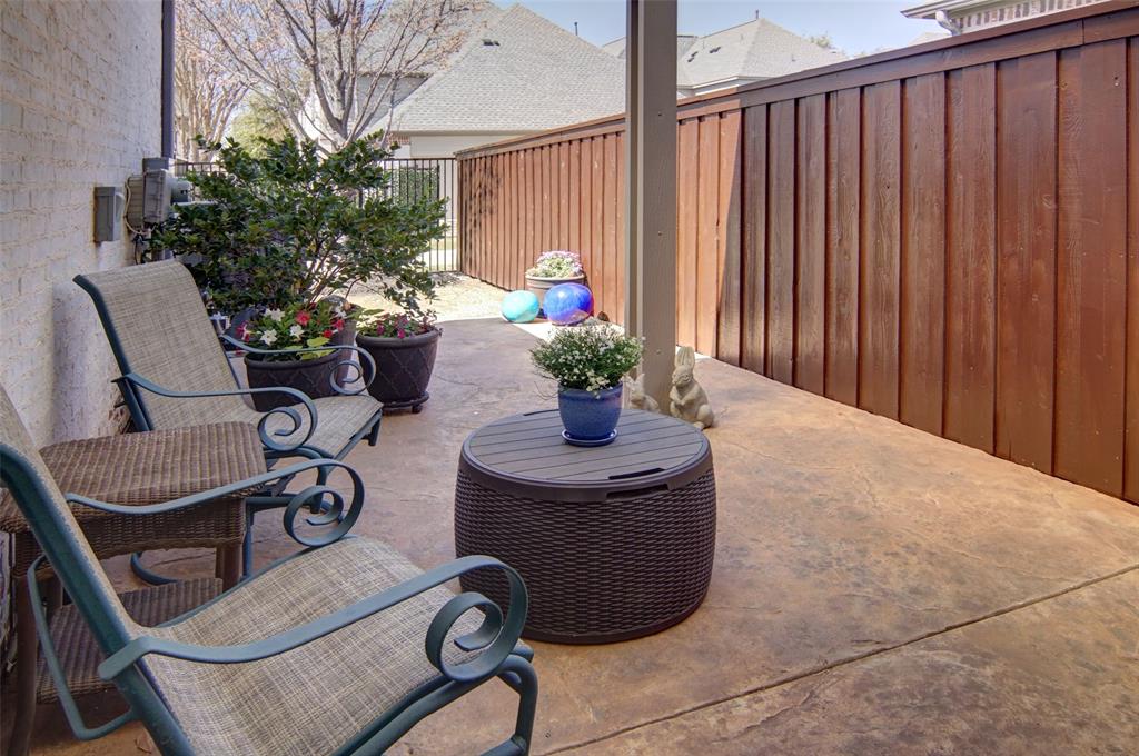 825 Milton Way Coppell, TX 75019 - Photo 31 of 35 a dining room with furniture and potted plants