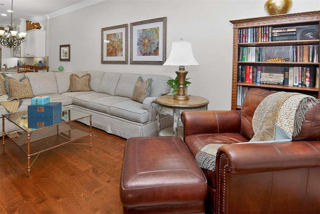 825 Milton Way Coppell, TX 75019 - Photo 4 of 35 a living room with furniture and a book shelf