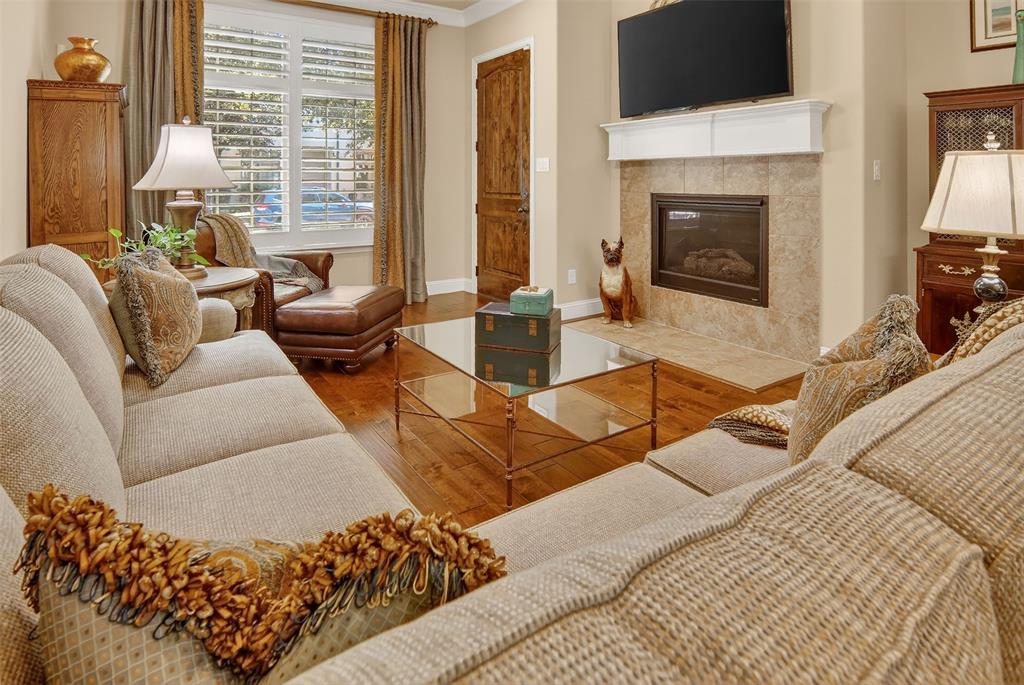 825 Milton Way Coppell, TX 75019 - Photo 5 of 35 a living room with furniture fireplace and flat screen tv
