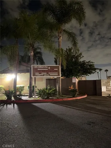 a view of a building with a street