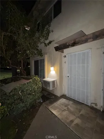 a house view with a backyard space