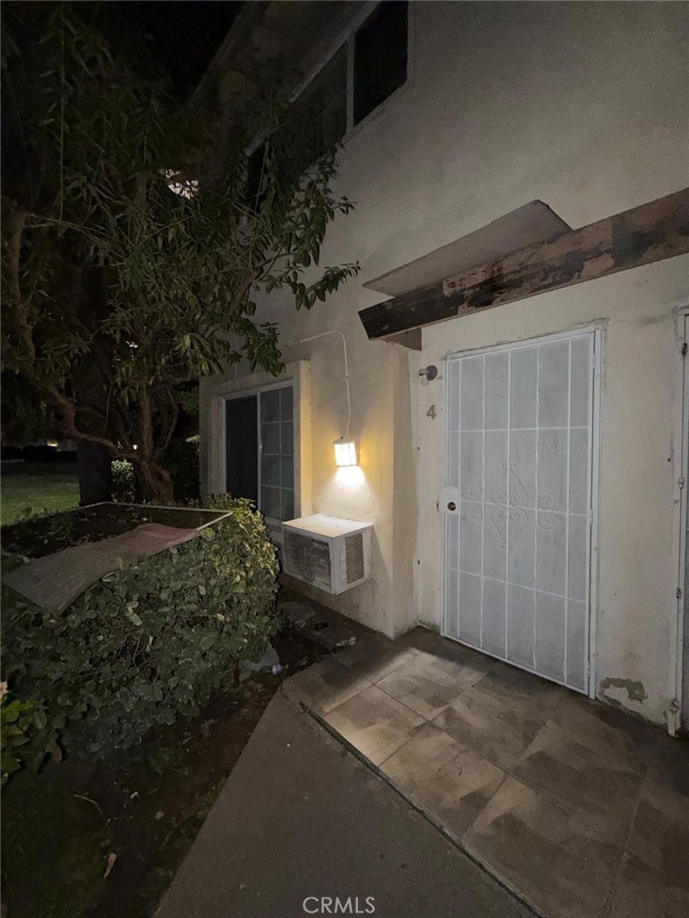 1602 North King Street, Unit S4 Santa Ana, CA 92706 - Photo 20 of 22 a house view with a backyard space